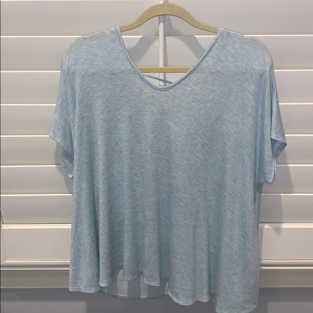 Light teal open back short sleeve shirt